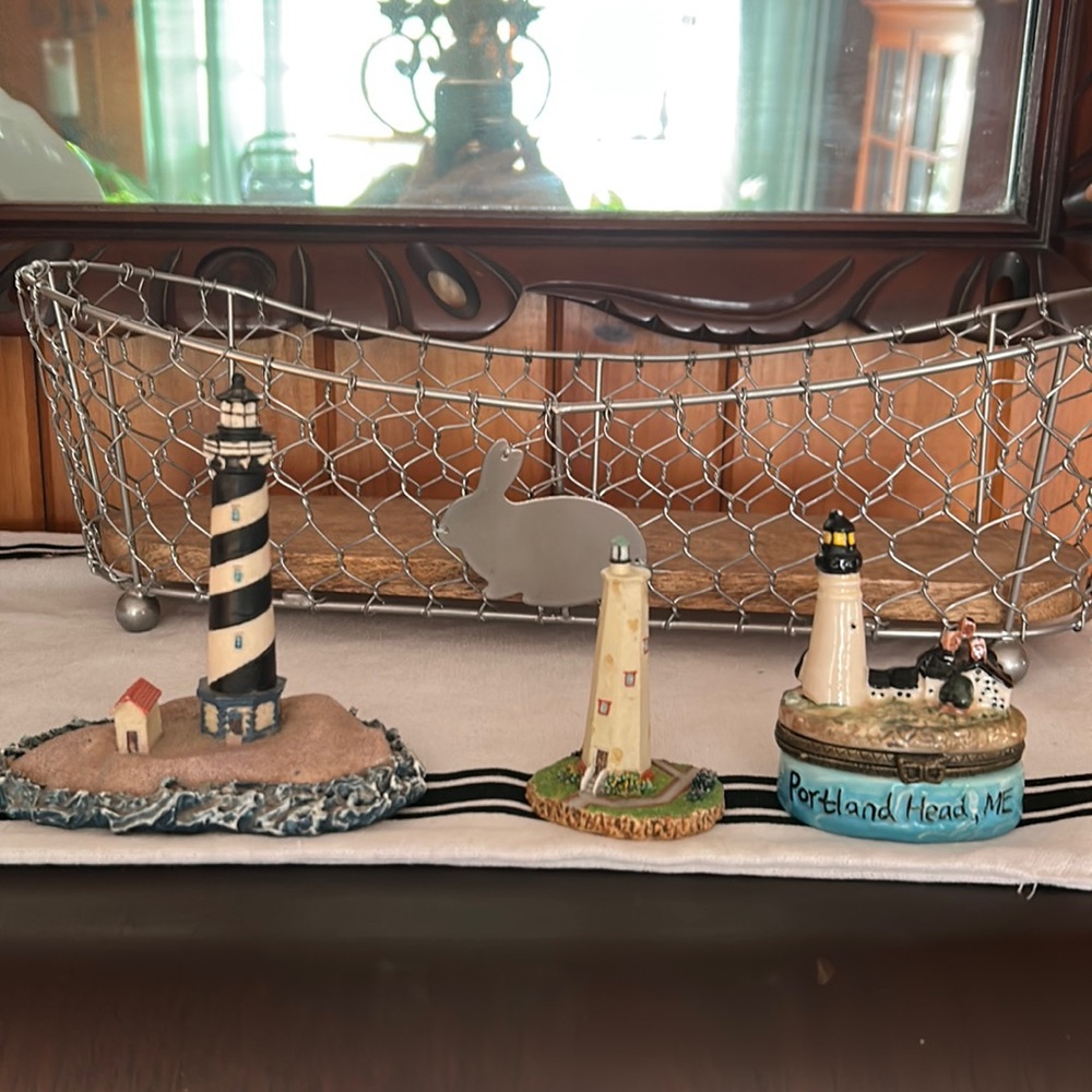 Three lighthouses of different sizes and styles. Add to your collection!